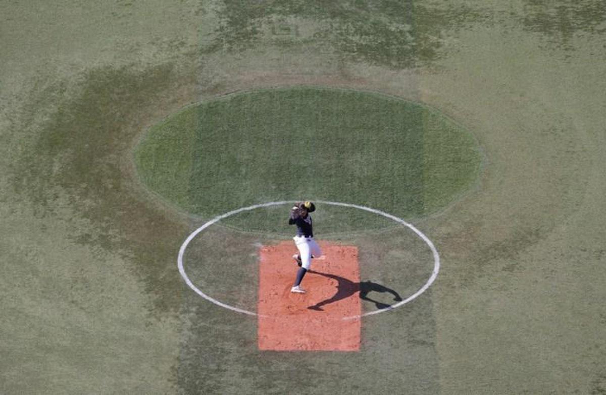 USA's starter Catherine Osterman hurls the ball during first inning of the Tokyo 2020 Olympic Games softball opening round game between USA and Mexico at Yokohama Baseball Stadium in Yokohama, Japan, on July 24, 2021. KAZUHIRO FUJIHARA / AFP