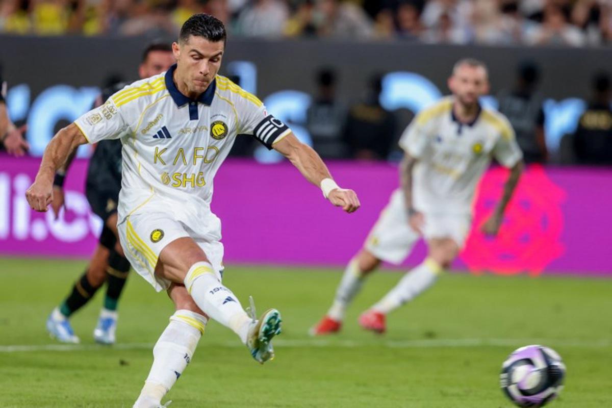 Nassr's Portuguese forward #7 Cristiano Ronaldo shoots from the penalty spot to miss during the Saudi Pro League football match between Al-Nassr and Al-Khaleej at Al-Awwal Park in Riyadh on May 21, 2025. Fayez NURELDINE / AFP