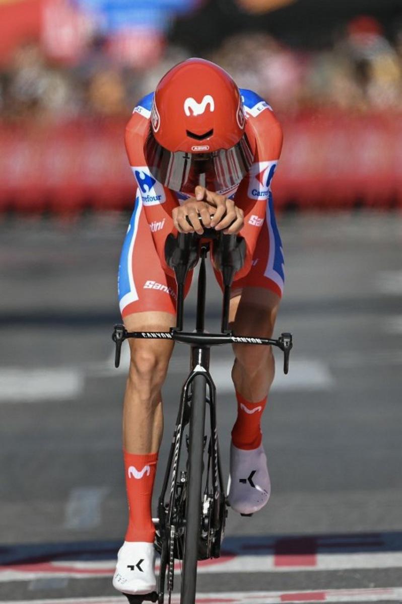 Overall race leader Team Movistar's Spanish rider Enric Mas crosses the finish line of the 18th stage of the Vuelta a Espana 2026 cycling tour, a 32,1 km individual time-trial race between El Puerto de Santa Maria and Jerez de la Frontera, on September 10, 2026. JORGE GUERRERO / AFP