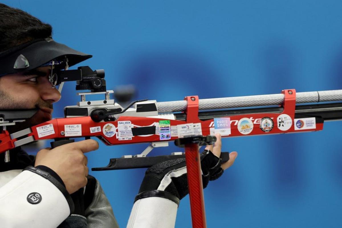 India's Arjun Babuta competes in the shooting 10m air rifle men's final during the Paris 2024 Olympic Games at Chateauroux Shooting Centre on July 29, 2024. Alain JOCARD / AFP