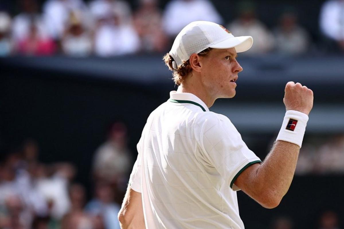 Italy's Jannik Sinner reacts against Serbia's Novak Djokovic during their men's singles semi-final tennis match on the twelfth day of the 2026 Wimbledon Championships at The All England Lawn Tennis and Croquet Club in Wimbledon, southwest London, on July 10, 2026. Henry Nicholls / AFP
