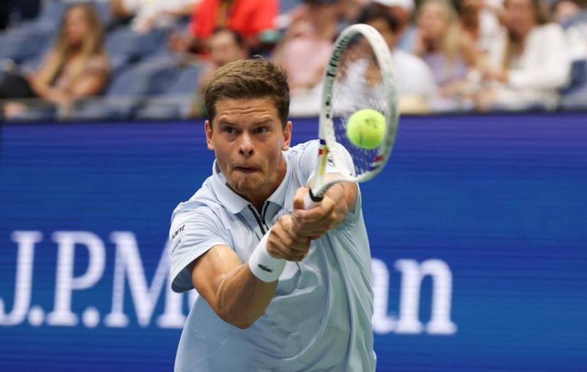 Belgium's Alexander Blockx returns the ball to Russia's Karen Khachanov during the men's singles quarter-final tennis match on day eleven of the US Open tennis tournament at the USTA Billie Jean King National Tennis Center in New York City on September 9, 2026. TIMOTHY A. CLARY / AFP
