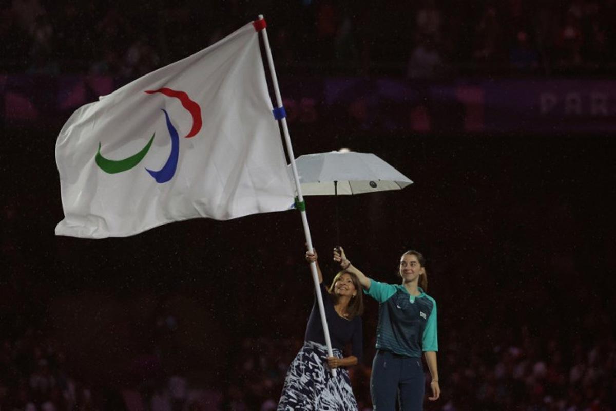 Mayor of Paris Anne Hidalgo waves the Paralympics flag during the Paris 2024 Paralympic Games Closing Ceremony at the Stade de France, in Saint-Denis, in the outskirts of Paris, on September 8, 2024. Thibaud Moritz / AFP