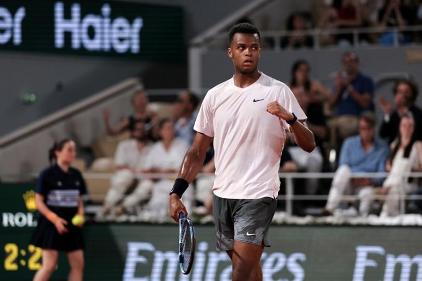France's Giovanni Mpetshi Perricard reacts after a point as he plays against Serbia's Novak Djokovic during their men's singles match on day 1 of the French Open tennis tournament on Court Philippe-Chatrier at the Roland-Garros Complex in Paris on May 24, 2026. Thomas SAMSON / AFP