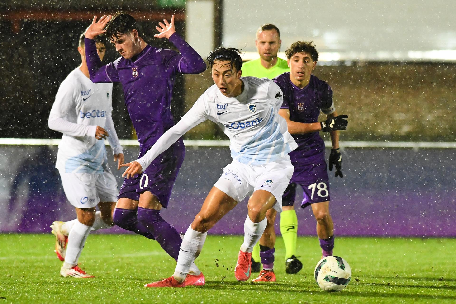 RSCA Futures' Robbie Philip Ure, Genk's Kenshin Yasuda and RSCA Futures' Anas Tajaouart pictured in action during a soccer match between RSCA Futures (U21) and Jong Genk (U21), Tuesday 28 January 2025 in Deinze, a postponed game of day 17 of the 2024-2025 'Challenger Pro League' second division of the Belgian championship. BELGA PHOTO JILL DELSAUX