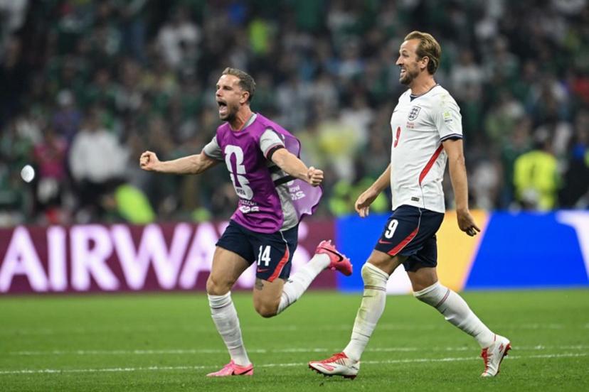 England's midfielder #14 Jordan Henderson and England's forward #09 Harry Kane celebrate after winning the 2026 World Cup round of 16 football match between Mexico and England at the Mexico City Stadium in Mexico City on July 5, 2026. CARL DE SOUZA / AFP