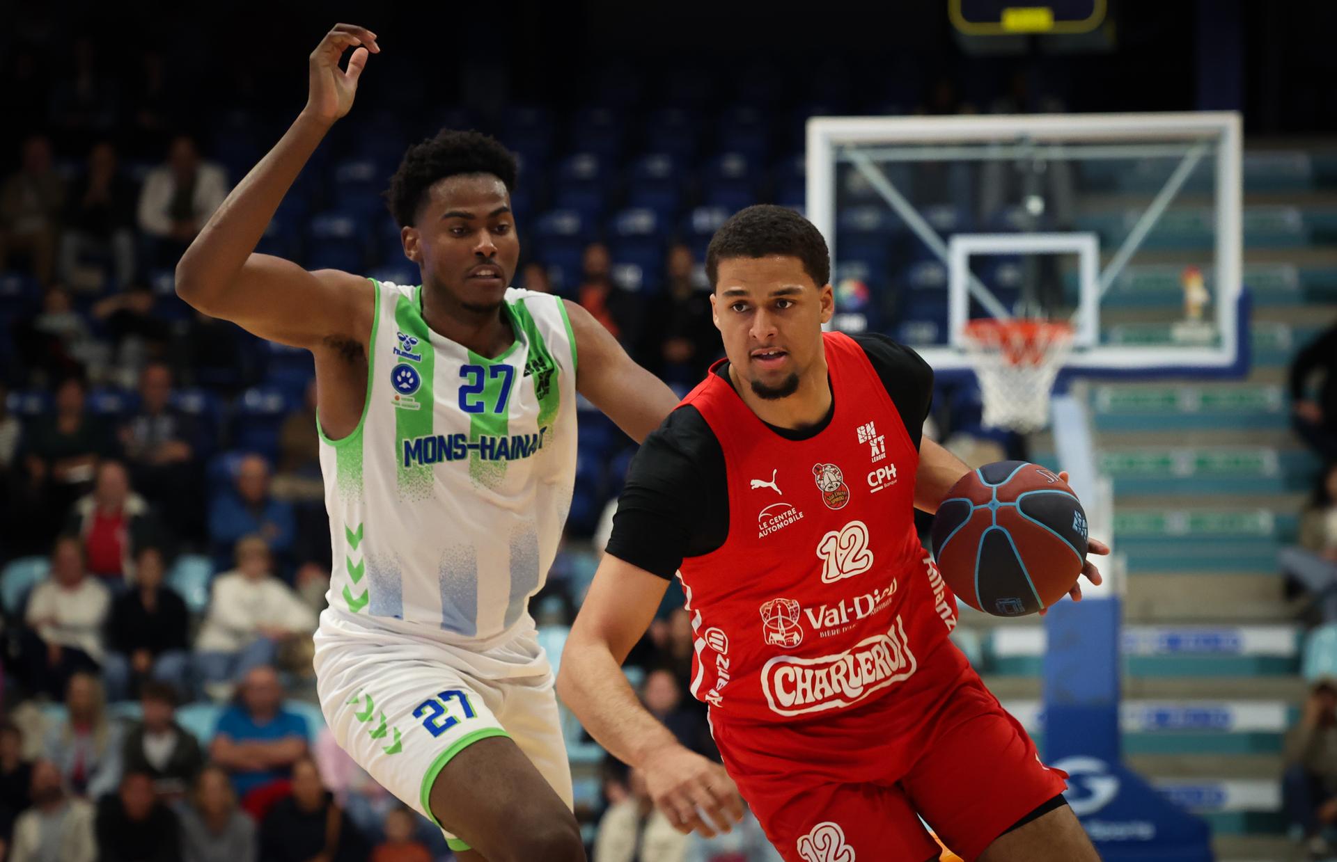 Mons' Fortune Katiki and Spirou's Maxime Bilolo Katuala fight for the ball during a basketball match between Mons-Hainaut and Spirou Charleroi, Wednesday 06 May 2026 in Mons, on day 33/34 of the 'BNXT League' Belgian/Dutch first division basketball championships. BELGA PHOTO VIRGINIE LEFOUR