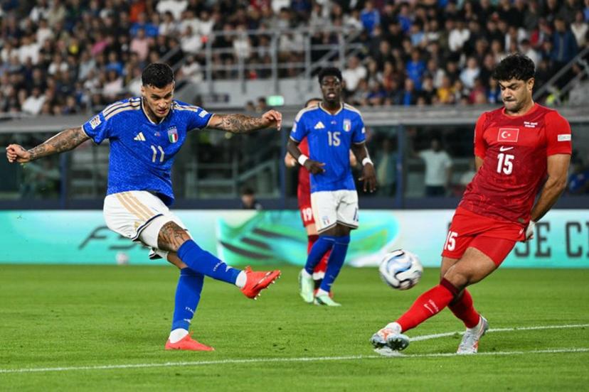 Italy's forward #11 Gianluca Scamacca shoots and tries to score during the UEFA Nations League football match (League A day 4, Group A1) between Italy and Turkey at the Renato Dall'Ara Stadium in Bologna on October 5, 2026. Alberto PIZZOLI / AFP