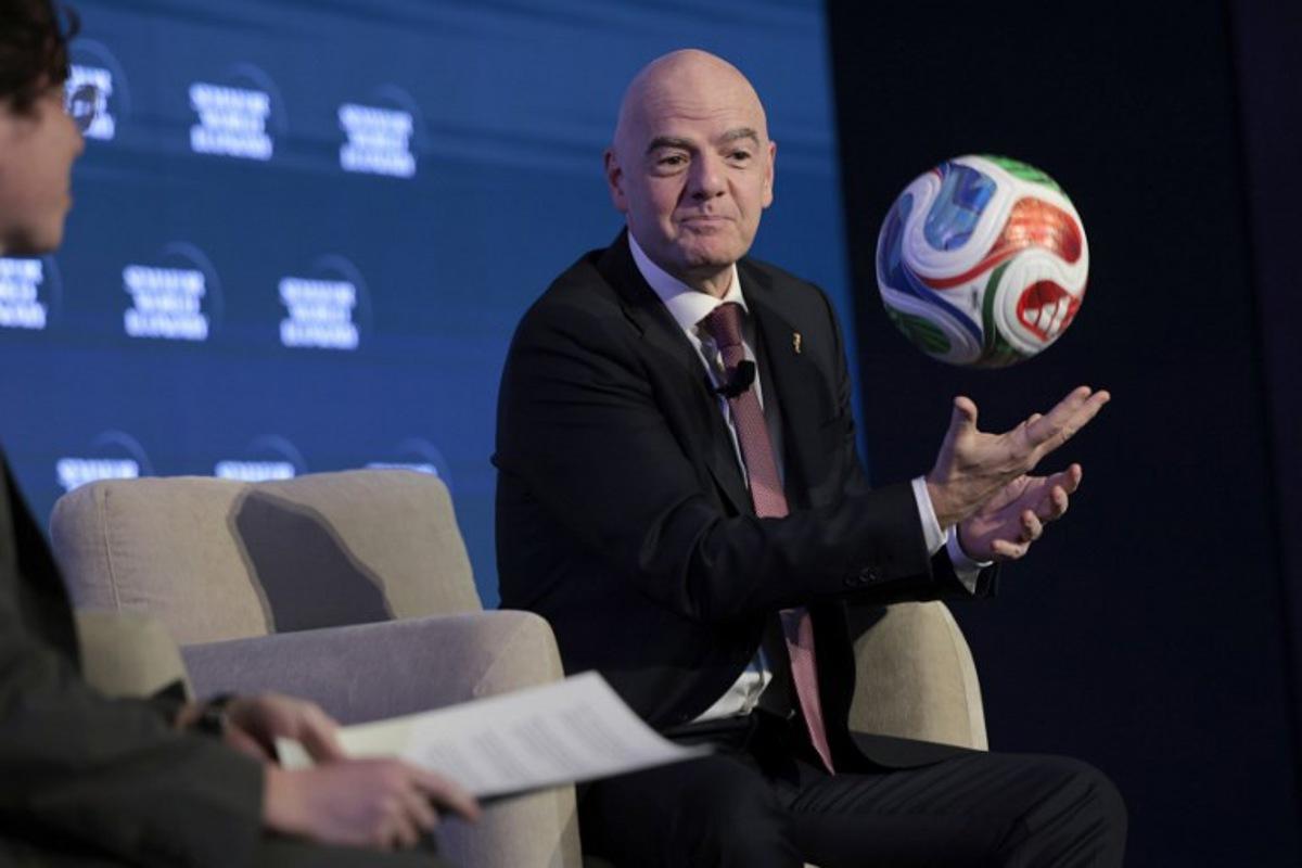 FIFA President Gianni Infantino juggles a foootball while speaking during the 2026 Semafor World Economy conference in Washington, DC, on April 15, 2026. Kent NISHIMURA / AFP
