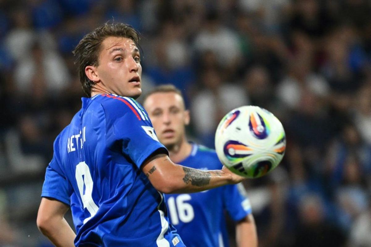 Italy's forward #09 Mateo Retegui looks at the ball during the 2026 World Cup qualifiers Europe zone group I football match between Italy and Moldova at the Mapei Stadium in Reggio Emilia, on June 9, 2025. Alberto PIZZOLI / AFP