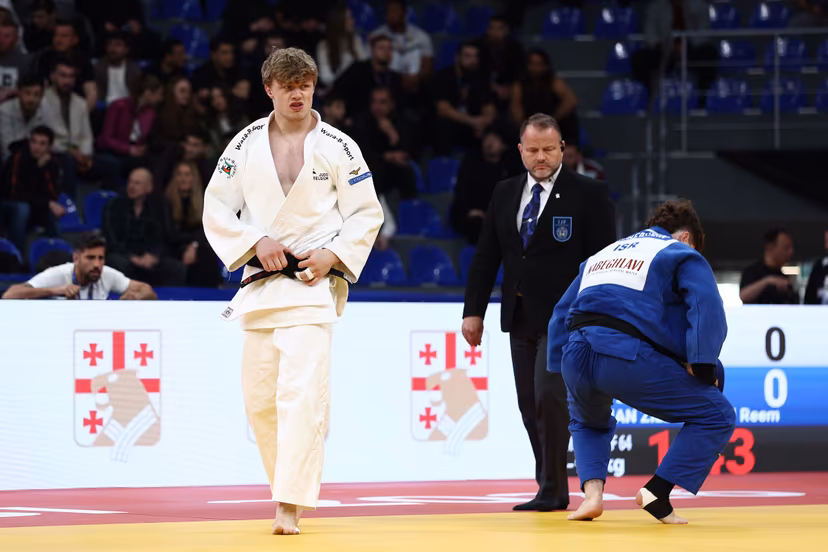 Belgian Jarne Duyck (white gi) competes against Israeli Reem Fridman Zilberstein (blue gi) in the first round of the men -90kg competition, at the European Championships judo in Tbilisi, Georgia, on Saturday 18 April 2026. BELGA PHOTO NIKOLA KRISTC