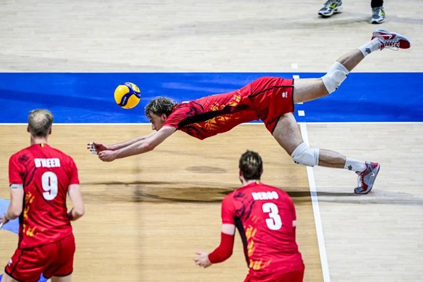 Belgium's Ferre Reggers dives for the ball against Italy during the 2025 Men's Volleyball World Championship at the Araneta Coliseum in Quezon City on September 16, 2025. SHERWIN VARDELEON / AFP