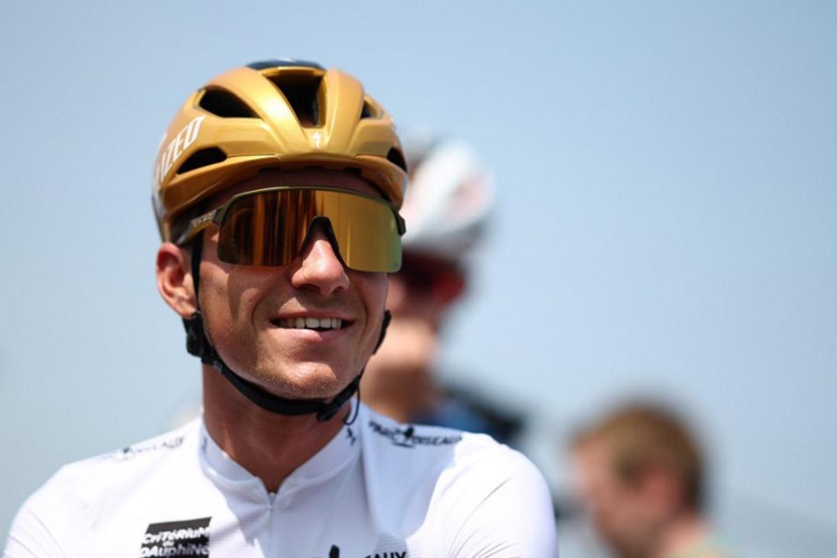 Soudal Quick-Step's Belgian rider Remco Evenepoel wearing the best young rider's white jersey reacts prior to the 2nd stage of the 77th edition of the Criterium du Dauphine cycling race, 204,6 km between Prémilhat and Issoire, on June 9, 2025. Anne-Christine POUJOULAT / AFP