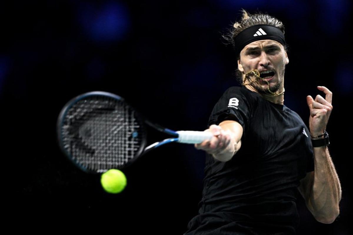 Germany's Alexander Zverev plays a forehand return to Russia's Daniil Medvedev during their men's singles quarter-final match on day five of the Paris ATP Masters 1000 tennis tournament at the Paris La Défense Arena in Nanterre, on the outskirts of Paris, on October 31, 2025. JULIEN DE ROSA / AFP