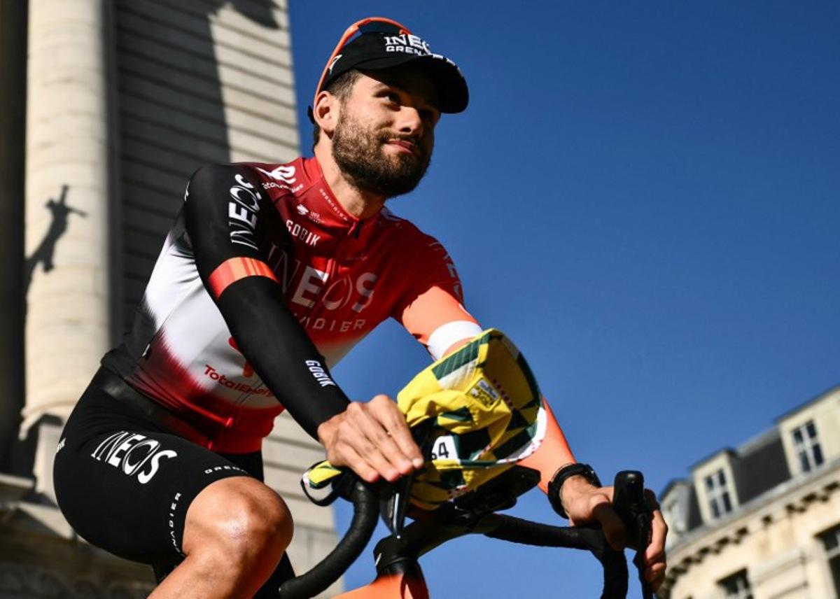 INEOS Grenadiers team's Italian rider Filippo Ganna cycles through Lille's city center during the official teams presentation days prior to the start of the 112th edition of the Tour de France cycling race, in Lille, northern France, on July 3, 2025. Marco BERTORELLO / AFP