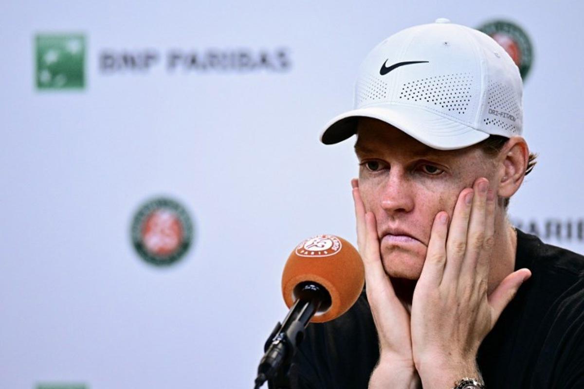 Italy's Jannik Sinner gives a press conference after being defeated by Argentina's Juan Manuel Cerundolo in their men's singles match on day 5 of the French Open tennis tournament on Court Philippe-Chatrier at the Roland-Garros Complex in Paris on May 28, 2026. JULIEN DE ROSA / AFP