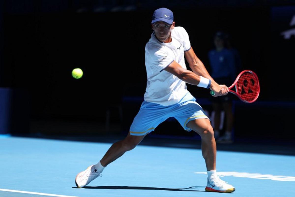 Argentina's Sebastian Baez hits a return to Spain's Jaume Munar during their men's singles match at the United Cup tennis tournament in Perth on January 2, 2026. COLIN MURTY / AFP