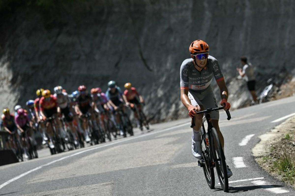 Netcompany INEOS team's French rider Kevin Vauquelin attempts a breakaway ahead of the pack of riders (peloton) during the 17th stage of the 113th edition of the Tour de France cycling race, 174,7 km between Chambéry and Voiron in the French Alps, on July 22, 2026. Jeff PACHOUD / AFP