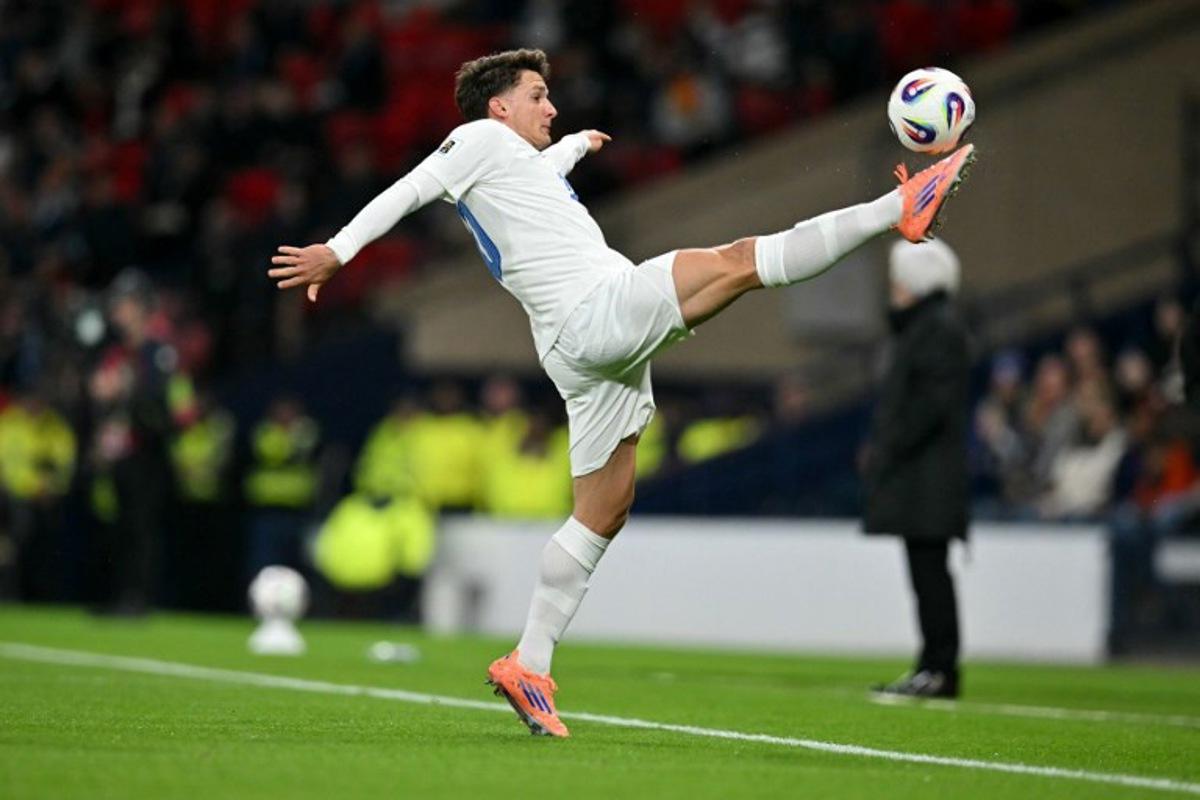 Greece's midfielder #10 Christos Tzolis controls the ball during the 2026 World Cup Group C qualifier football match between Scotland and Greece, at Hampden Park Stadium, in Glasgow, on October 9, 2025. ANDY BUCHANAN / AFP