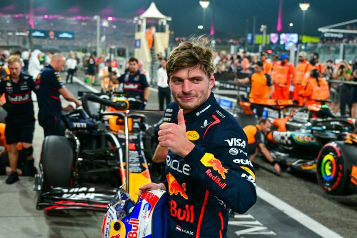 Red Bull Racing's Dutch driver Max Verstappen reacts after taking the pole position at the end of the qualifying session ahead of the Abu Dhabi Formula One Grand Prix at the Yas Marina Circuit in Abu Dhabi on December 6, 2025. Andrej ISAKOVIC / AFP