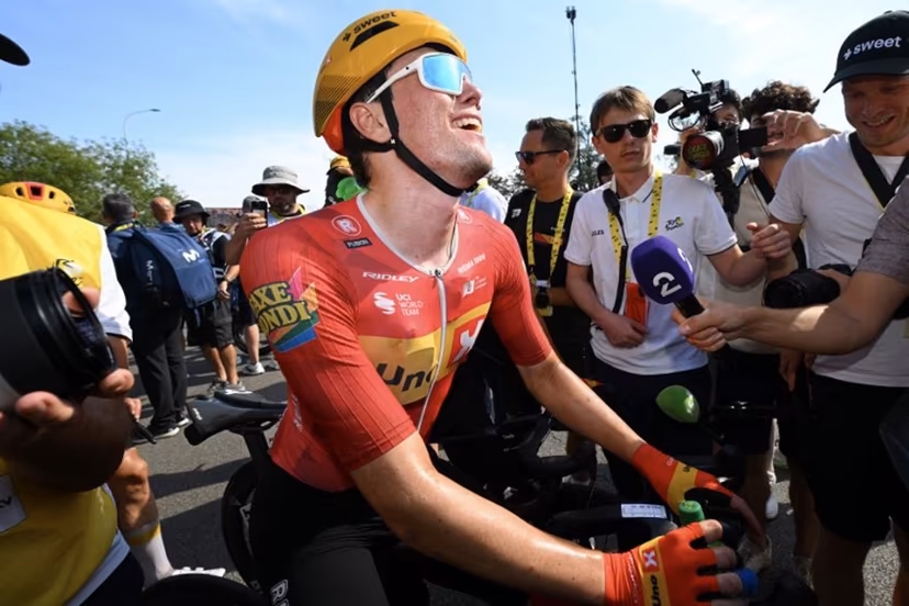 Uno-X Mobility team's Norwegian rider Soren Waerenskjold celebrates after winning the 11th stage of the 113th edition of the Tour de France cycling race, 161,3 km between Vichy and Nevers in central France, on July 15, 2026. Tim De Waele / POOL / AFP