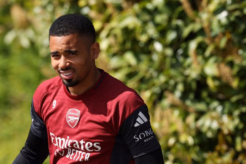 Arsenal's Brazilian striker #09 Gabriel Jesus arrives to take part in a team training session at London Colney, north of London, on April 14, 2026, on the eve of their UEFA Champions League, quarter-final, second-leg football match against Sporting Lisbon. Adrian Dennis / AFP