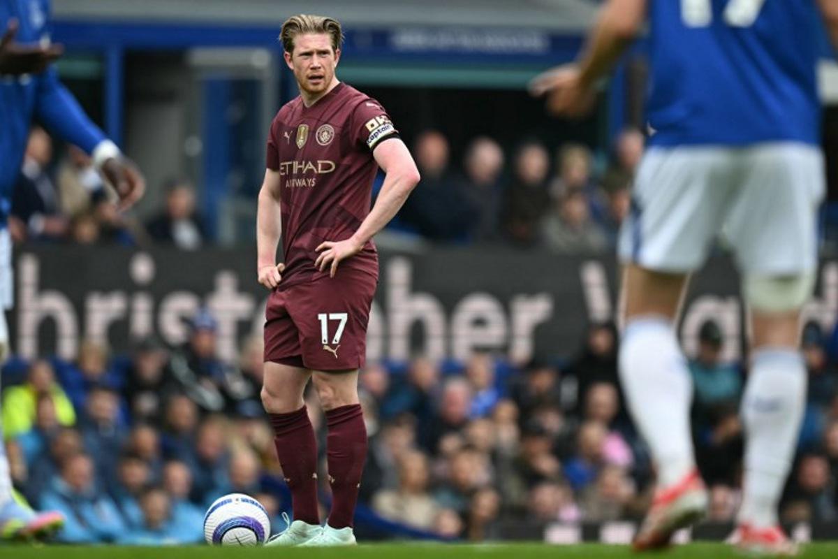 Manchester City's Belgian midfielder #17 Kevin De Bruyne waits to take a freekick during the English Premier League football match between Everton and Manchester City at Goodison Park in Liverpool, north west England on April 19, 2025. Paul ELLIS / AFP