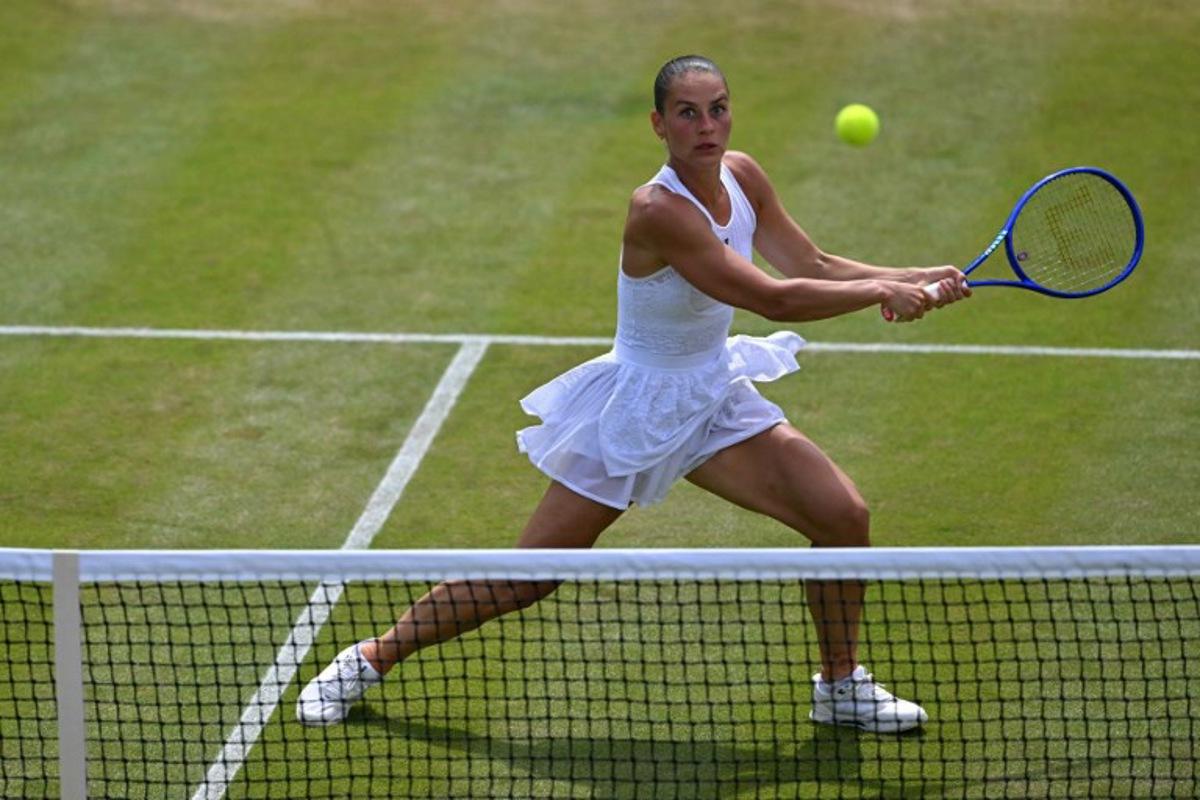 Ukraine's Marta Kostyuk returns to US player Ashlyn Krueger during their women's singles round of 16 tennis match on the eighth day of the 2026 Wimbledon Championships at The All England Lawn Tennis and Croquet Club in Wimbledon, southwest London, on July 6, 2026. Glyn KIRK / AFP
