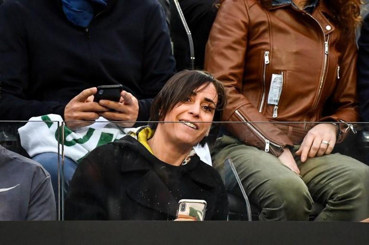 Former italian tennis player Flavia Pennetta, smiles as she looks at her husband Italy's Fabio Fognini playing against France's Jo-Wilfried Tsonga during their ATP Masters tournament tennis match at the Foro Italico in Rome, on May 13, 2019. Andreas SOLARO / AFP