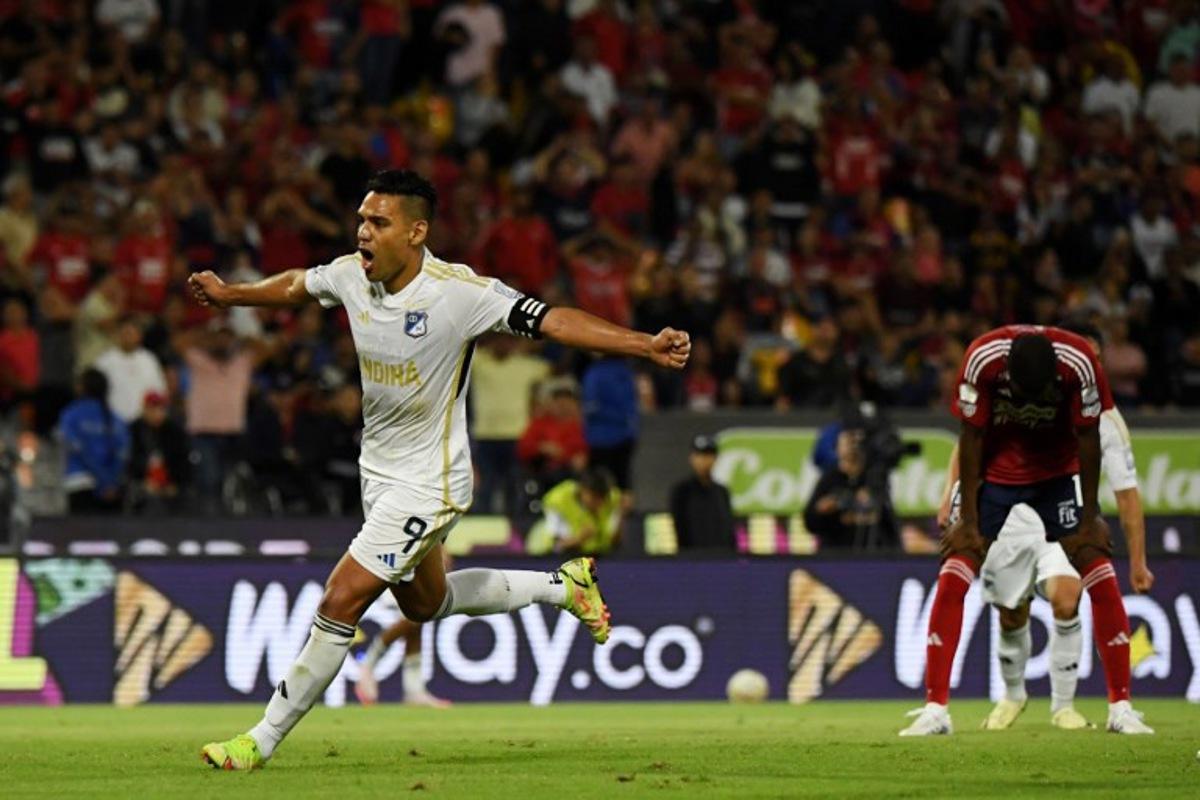 Millonarios' forward Radamel Falcao (L) celebrates his team's first goal scored by Millonarios' Argentine forward Santiago Giordana (unseen) during the Liga Betplay Dimayor II football league match between Independiente Medellin and Millonarios at Atanasio Girardot Stadium in Medellin, Colombia on July 18, 2024. Jaime SALDARRIAGA / AFP
