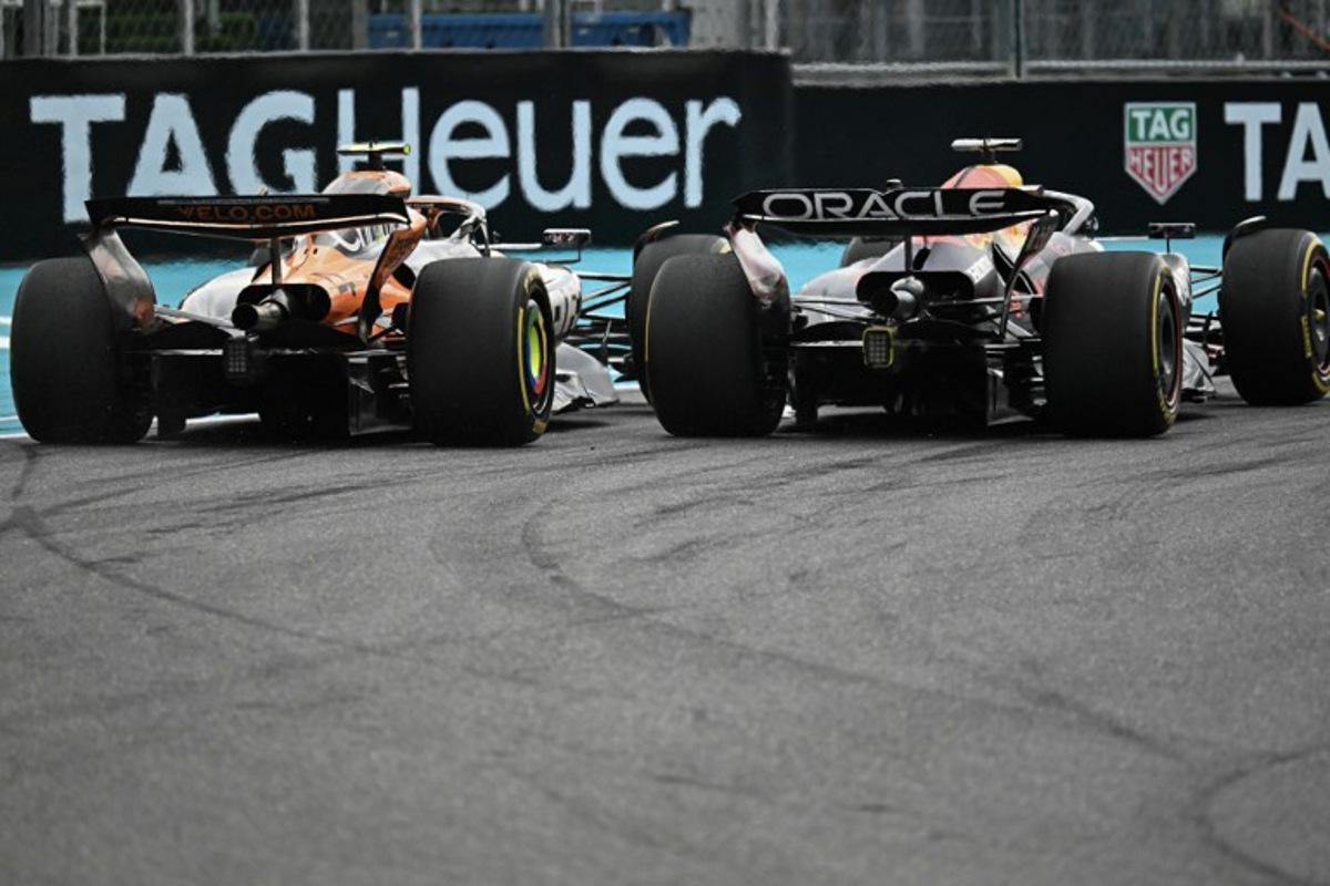 (L-R) McLaren's British driver Lando Norris and Red Bull Racing's Dutch driver Max Verstappen race during the 2025 Miami Formula One Grand Prix at Miami International Autodrome in Miami Gardens, Florida, on May 4, 2025. Chandan Khanna / AFP