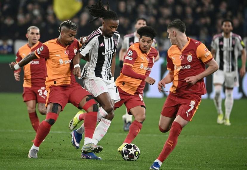 Juventus' French midfielder #19 Khephren Thuram (2nd L) fights for the ball with Galatasaray's Gabonese midfielder #99 Mario Lemina (L), Brazilian midfielder #8 Gabriel Gomez Sara (2nd R) and Hungarian forward #7 Rolanad Sallai (R) during the UEFA Champions League, knockout round play-off second leg, football match between Juventus FC and Galatasaray SK at the Allianz stadium in Turin, on February 25, 2026. Isabella BONOTTO / AFP