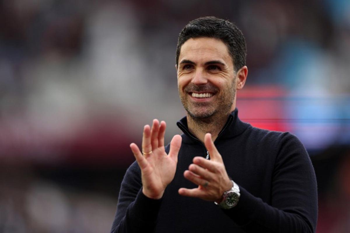 Arsenal's Spanish manager Mikel Arteta applauds the fans following the English Premier League football match between West Ham United and Arsenal at the London Stadium, in east London on May 10, 2026. Adrian Dennis / AFP