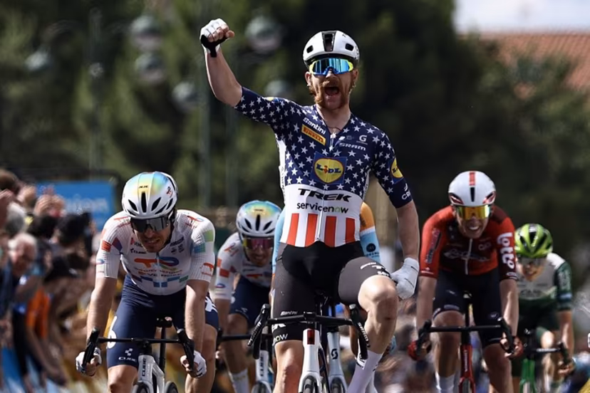 Lidl-Trek's US rider Quinn Simmons celebrates as he crosses the finish line to win the 4th stage of the Tour Auvergne-Rhone-Alpes cycling race (formerly known as the Criterium du Dauphine), 167,4km between Le Puy-en-Velay and Montrond-les-Bains, central France, on June 10, 2026. Anne-Christine POUJOULAT / AFP