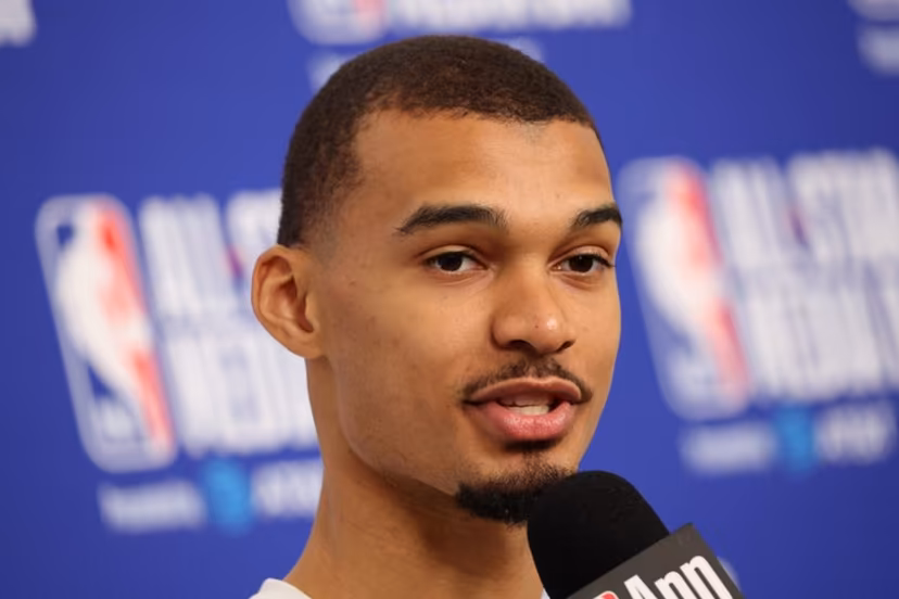 French basketball player Victor Wembanyama of the San Antonio Spurs speaks to the media during the NBA All-Star media day at the Intuit Dome in Inglewood, California, on February 14, 2026. Patrick T. Fallon / AFP