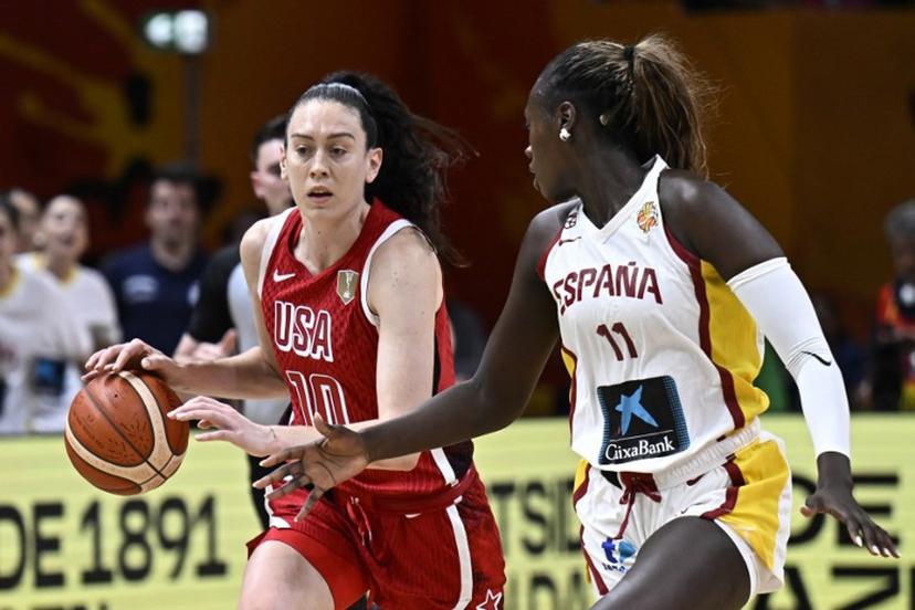 USA's power forward #10 Breanna Stewart and Spain's center #11 Awa Fam vie for the ball during the 2026 FIBA Women's Basketball World Cup semi-final match between Spain and the United States in Berlin on September 12, 2026. Tobias SCHWARZ / AFP