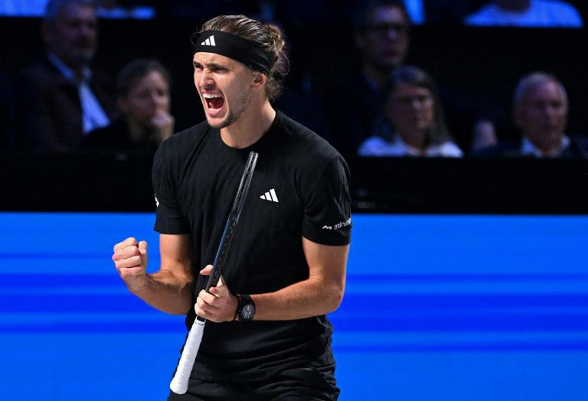 Germany's Alexander Zverev reacts as he plays against Italy's Matteo Arnaldi during their men's round of 16 singles match against at the ATP Vienna Open tennis tournament in Vienna, Austria, on October 23, 2025. HELMUT FOHRINGER / APA / AFP
