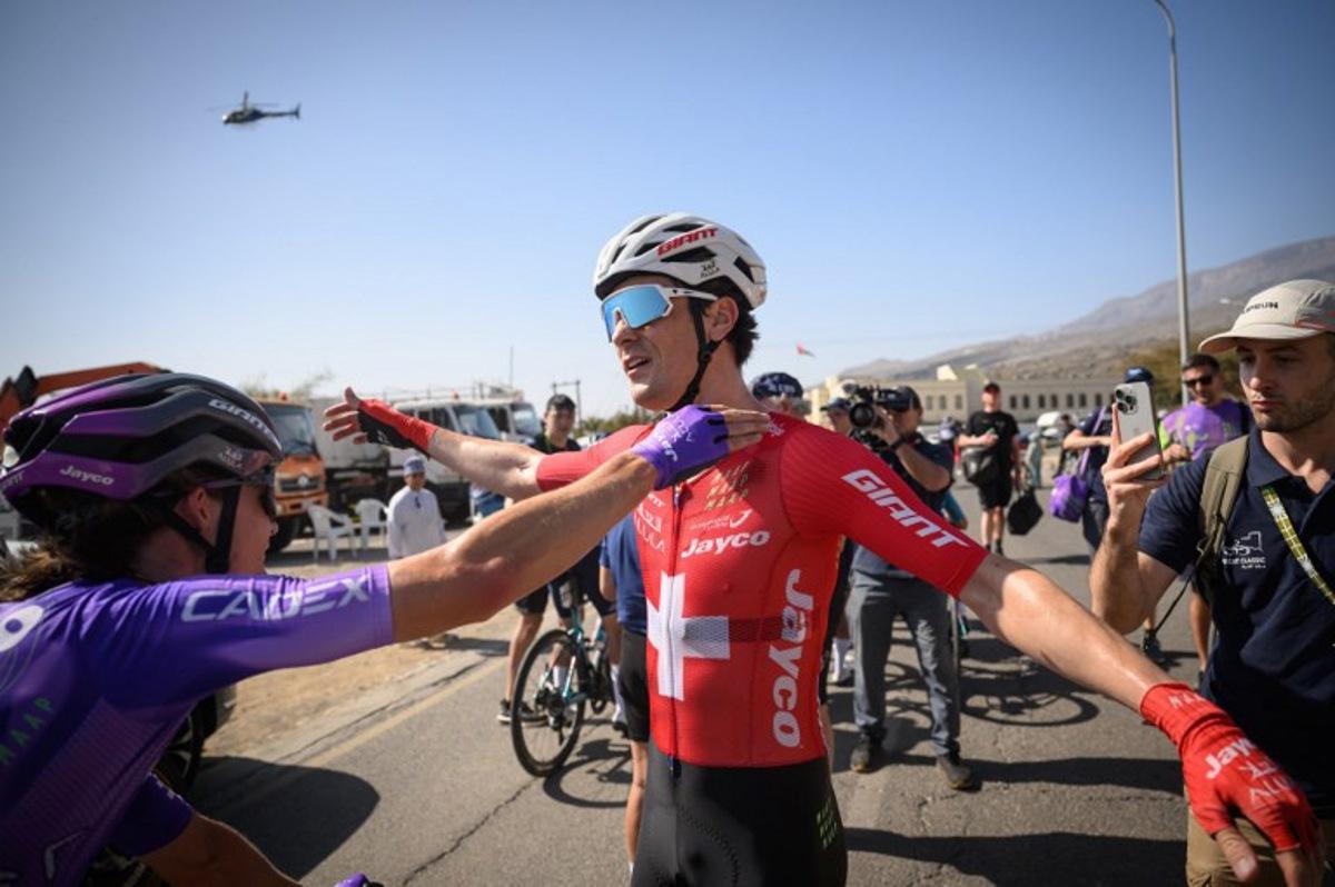 Team Jayco AlUla Swiss rider Mauro Schmid celebrates after winning the 3d stage of the Tour of Oman cycling race from Samail "Al Fayhaa Resthouse" to Misfat Al Abriyeen, on February 9, 2026. Loic VENANCE / AFP