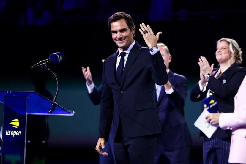 Swiss former tennis player Roger Federer wears his official International Tennis Hall of Fame ring after receiving it on the court at Arthur Ashe Stadium on day two of the US Open tennis tournament at the USTA Billie Jean King National Tennis Center in New York City on August 31, 2026. CHARLY TRIBALLEAU / AFP