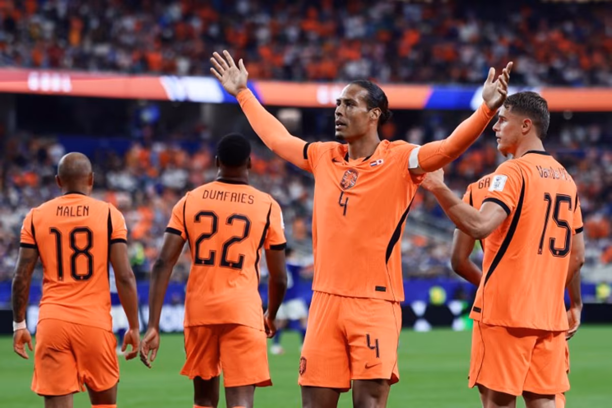 Netherlands' defender #04 Virgil van Dijk (C) celebrates after scoring the opening goal during the 2026 World Cup Group F football match between the Netherlands and Japan at the Dallas Stadium in Arlington on June 14, 2026. Aric Becker / AFP