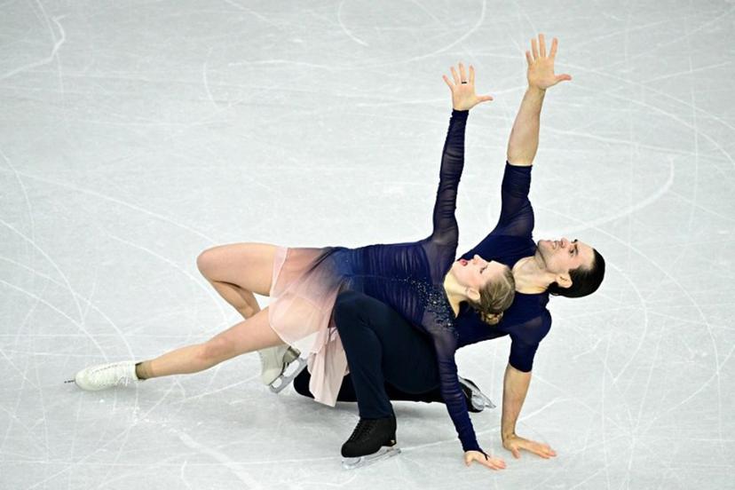 Germany's Minerva Fabienne Hase and Nikita Volodin compete in the figure skating pair skating free skating final during the Milano Cortina 2026 Winter Olympic Games at Milano Ice Skating Arena in Milan on February 16, 2026. JULIEN DE ROSA / AFP