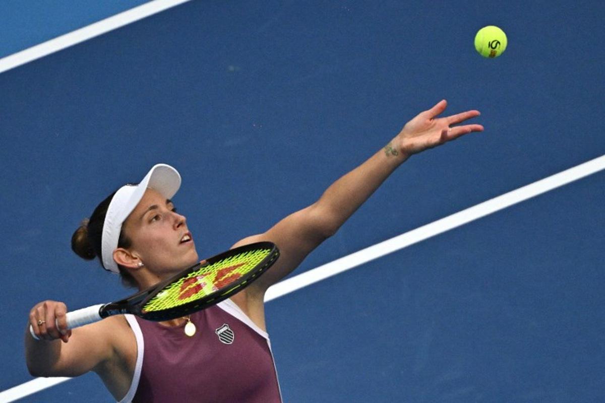Belgium's Elise Mertens serves to USA's Coco Gauff during their women's singles match at the China Open tennis tournament in Beijing on October 7, 2026. Pedro Pardo / AFP