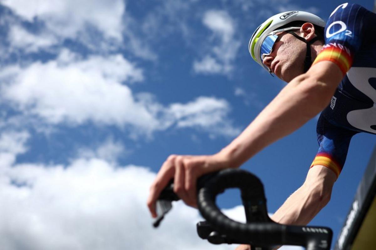 Movistar Team's Spanish rider Ivan Romeo waits for the start of the 2nd stage of the Paris-Nice cycling race, 187 km between Épône and Montargis, on March 9, 2026. Anne-Christine POUJOULAT / AFP