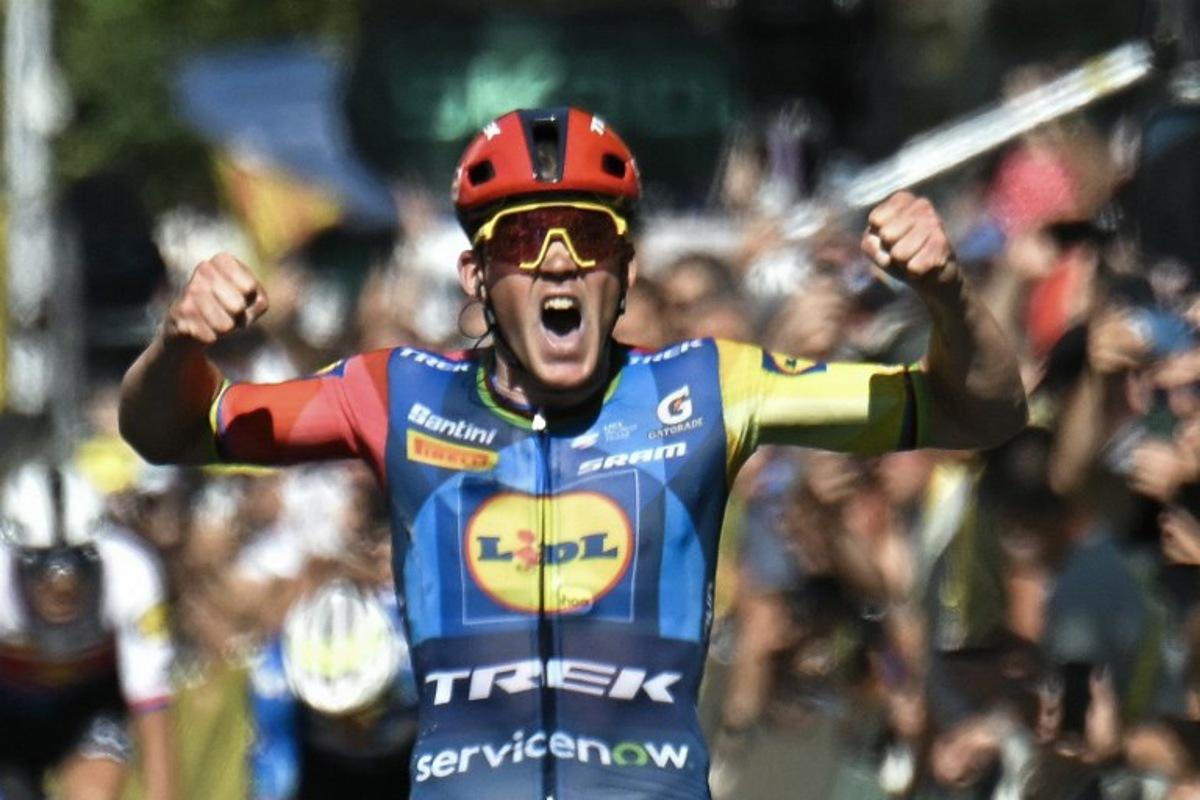 Lidl - Trek team's Danish rider Mads Pedersen celebrates as he crosses the finish line to win the 4th stage of the 113th edition of the Tour de France cycling race, 182 km between Carcassonne and Foix in southwestern France, on July 7, 2026. Loic VENANCE / AFP
