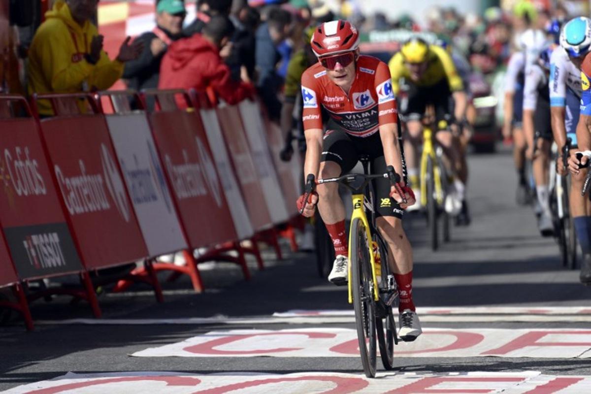 Team Visma-Lease a bike's Danish rider Jonas Vingegaard crosses the finish line of the sixth stage of La Vuelta a Espana cycling tour, a 170 km race between Olot and Pal, in Andorra, on August 28, 2025. Josep LAGO / AFP