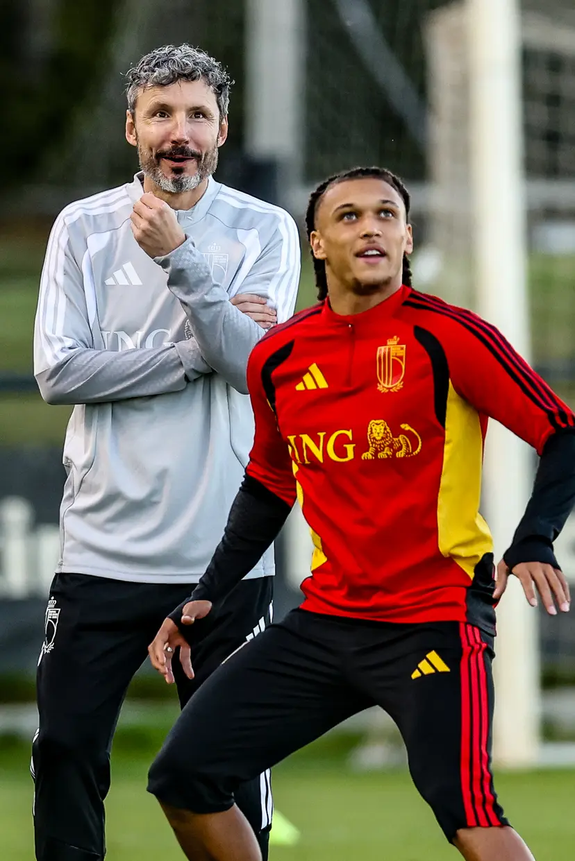 Belgium's Diego Da Silva Moreira and Belgium's head coach Mark van Bommel pictured during a training session of the Red Devils, the Belgian national soccer team, at the national training center in Tubize, Monday 21 September 2026. The team is preparing for fixtures in the UEFA Nations League competition. BELGA PHOTO BRUNO FAHY