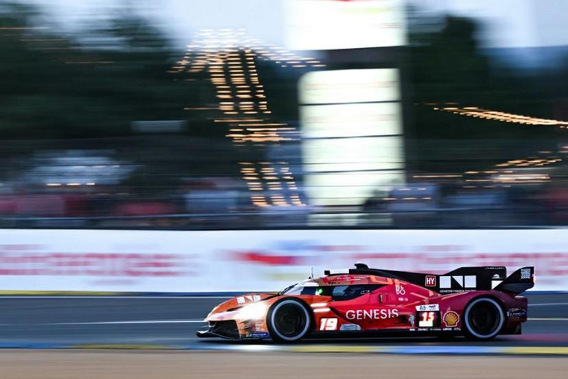 German BMW M Hybrid V8 Hypercar #15 of BMW M TEAM WRT (LMDh) competes during the 94th edition of the 24 Hours of Le Mans, the motor endurance race, in Le Mans, western France, on June 14, 2026. Lou BENOIST / AFP