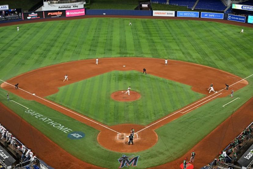 Panama's pitcher #24 Kenny Hernadez throws the ball to first base during the Caribbean Series baseball game between Mexico and Panama at LoanDepot Park in Miami, Florida, on February 3, 2024. Chandan Khanna / AFP