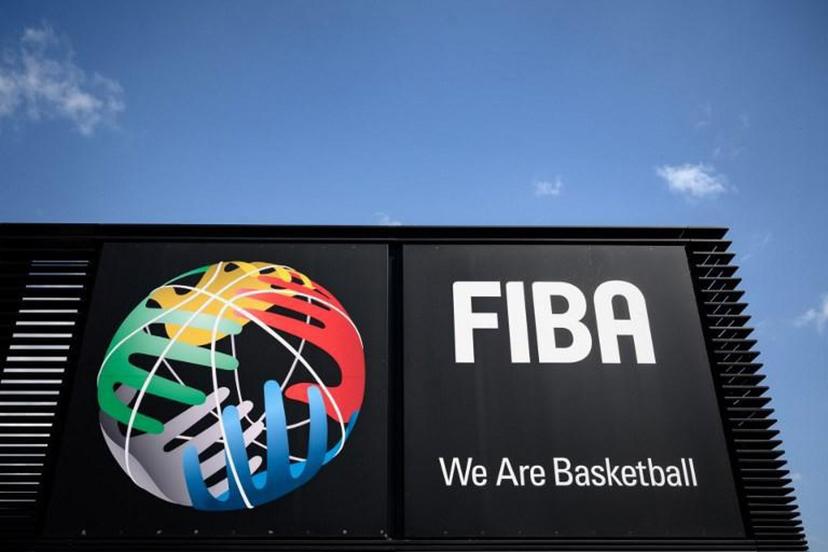 A picture taken on April 24, 2020 in Mies, shows a board at the entrance of the International Basketball Federation FIBA, as Switzerland remains in lockdown during the COVID-19 outbreak, caused by the novel coronavirus. Short-time working, drawdowns from reserves, bank loans or call for help to the Intenational Olympic Committee, the hitherto prosperous international sports federations are suffering from the cancellation or postponement of their events caused by the coronavirus pandemic, which deprives them of income. Fabrice COFFRINI / AFP
