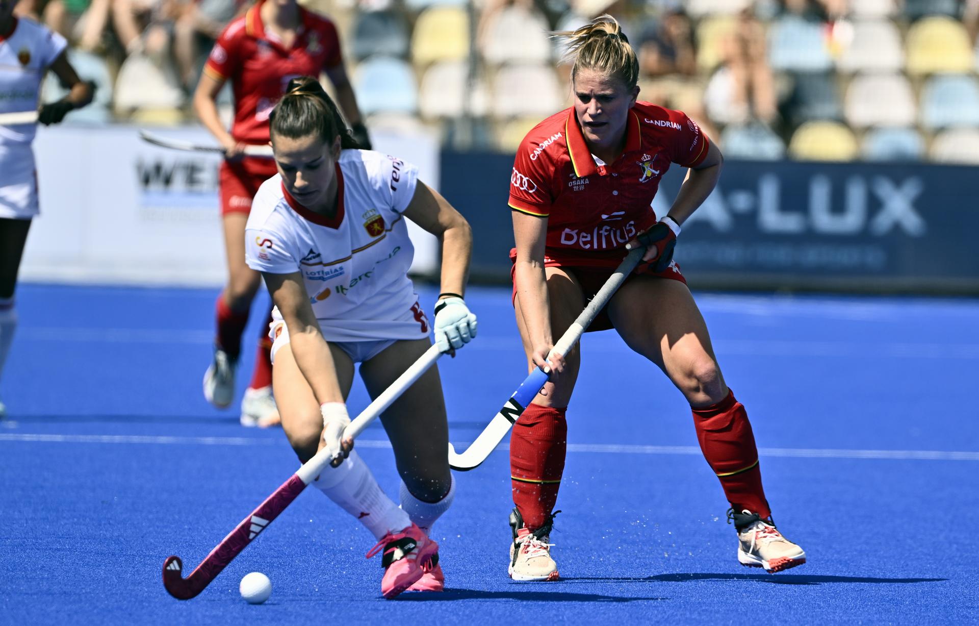 Spain's Lucia Jimenez and Belgium's Alix Gerniers pictured in action during a hockey game between Belgian national team Red Panthers and Spain, match 1/3 in the pool stage of the 2025 women's European championships, Sunday 10 August 2025 in Monchengladbach, Germany. BELGA PHOTO ERIC LALMAND